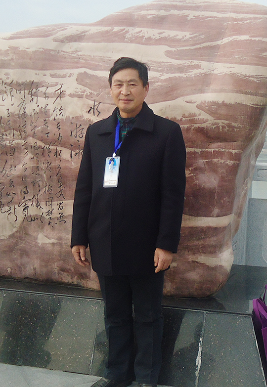 严坤明个人照-.jpg