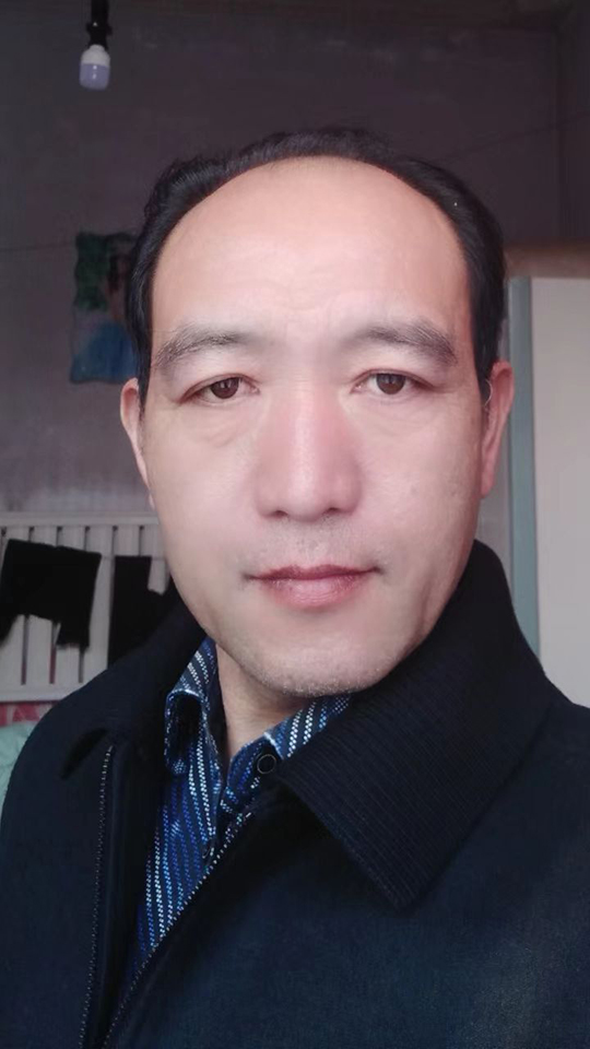 墨达个人照片.jpg
